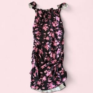 Elegant Black Dress with Pink Floral Accents